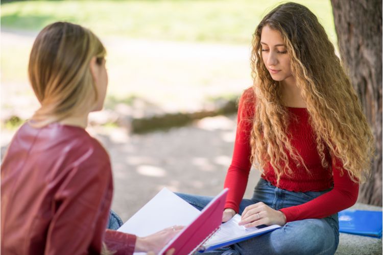 Two college students building a friendship as an introvert and extrovert