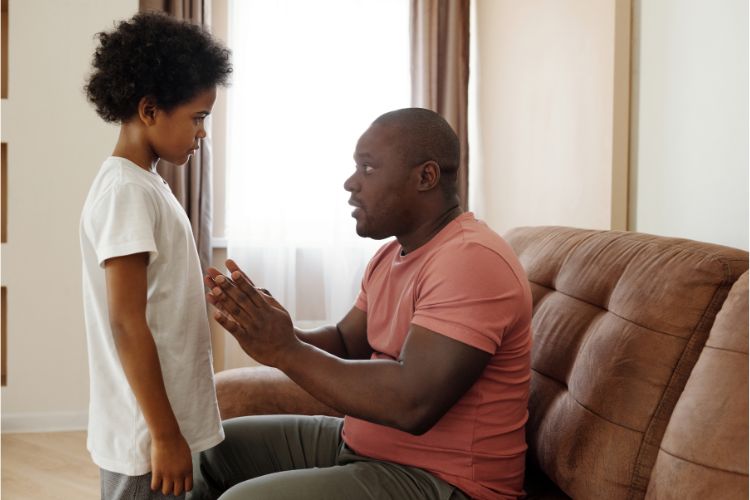 Parent and child talking, building an open communication for bullying concerns