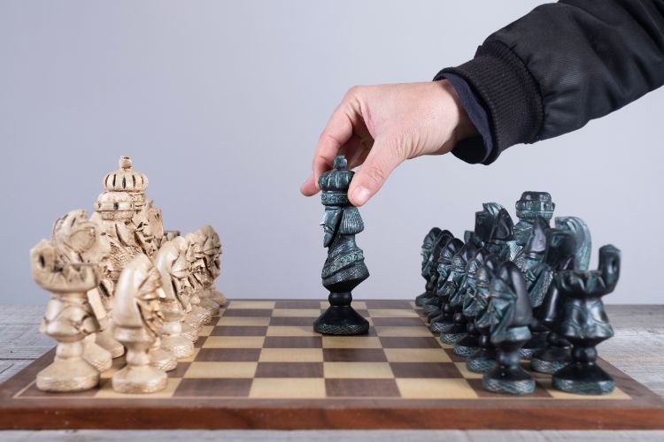 Weird College Classes - Chessboard mid-game representing game theory in social situations