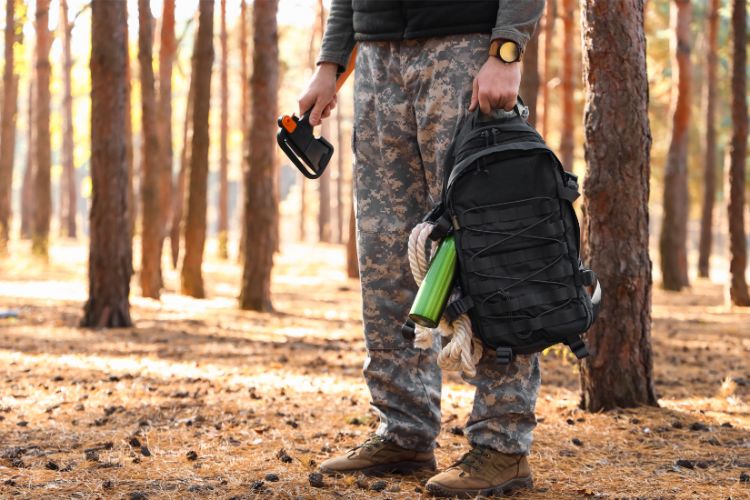 Student prepared with survival gear for zombie survival course